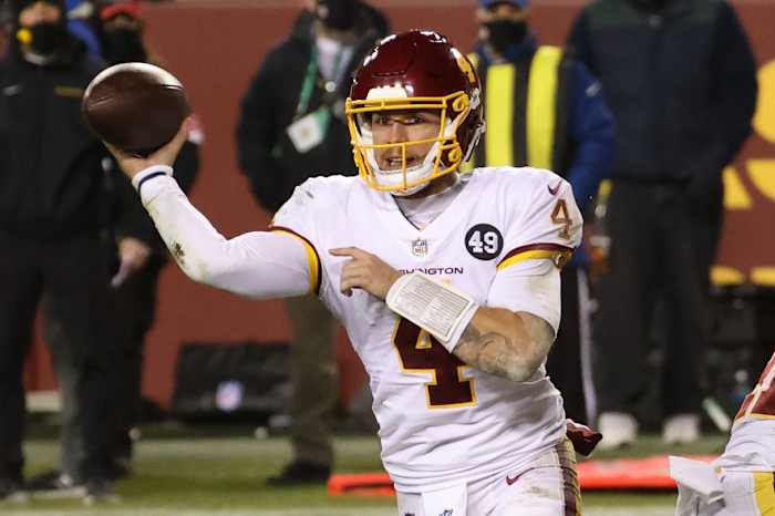 Jan 9, 2021; Landover, Maryland, USA; Washington Football Team quarterback Taylor Heinicke (4) passes the ball against the Tampa Bay Buccaneers at FedExField.